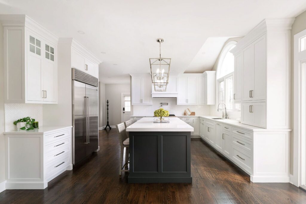Wellsford Cabinetry Custom Kitchen Framed Plain Inset Hudson Door Style in Designer White Island in Graphite Center View